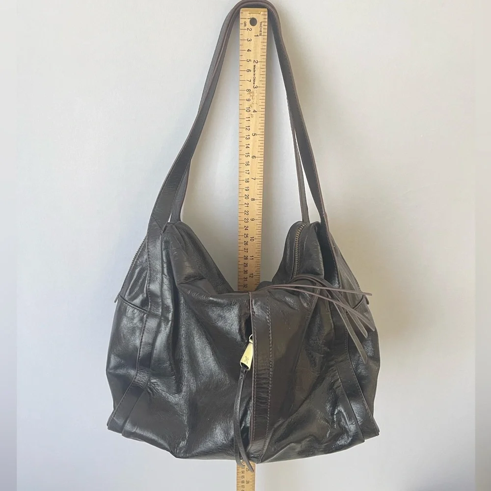 HOBO Slouchy Leather Bag With Tassels and Brass Hardware